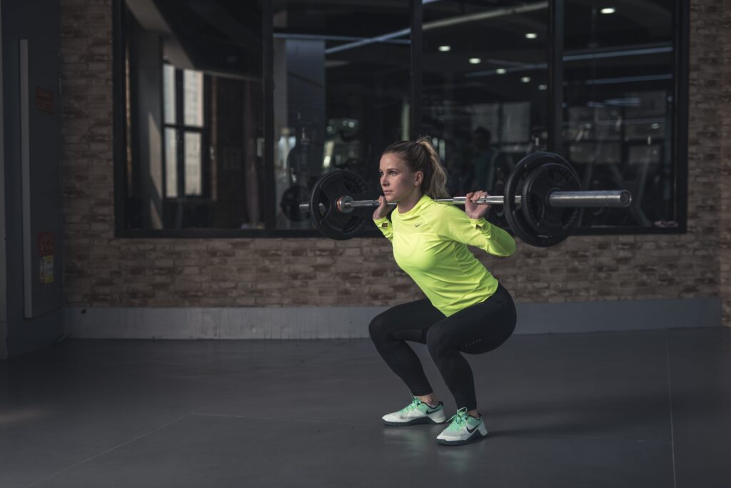 Woman does light squat